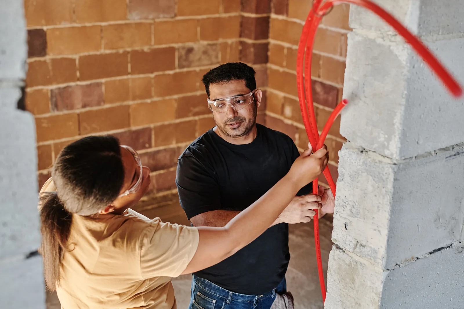 Running conduit across a block wall, for ev rebate in Calgary