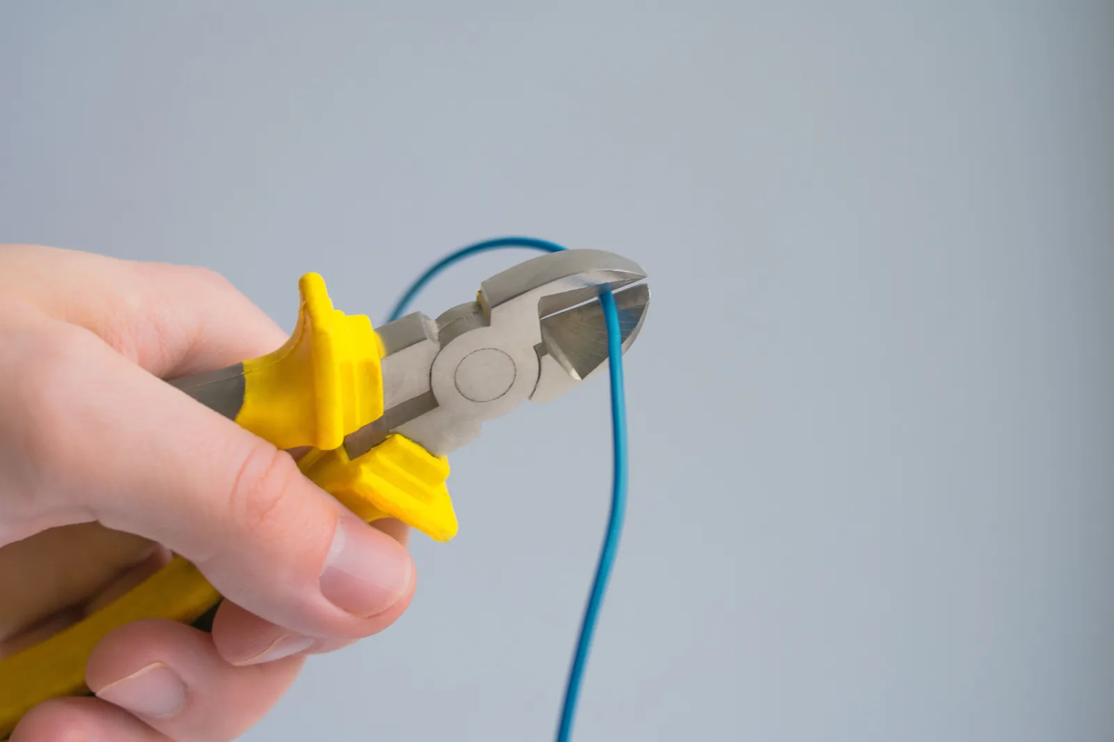 Cutting a conductor to length, for licensed electrician in Calgary